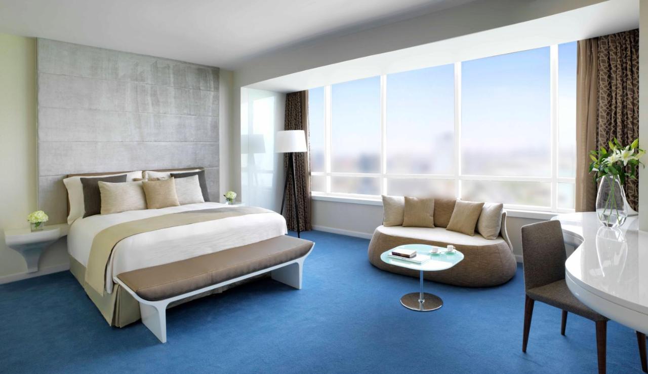 Symphony Style Hotel Kuwait Salmiya ภายนอก รูปภาพ A bedroom at the hotel
