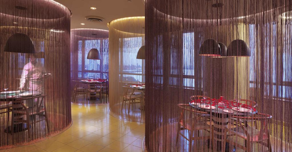 Symphony Style Hotel Kuwait Salmiya ภายนอก รูปภาพ Interior of the restaurant